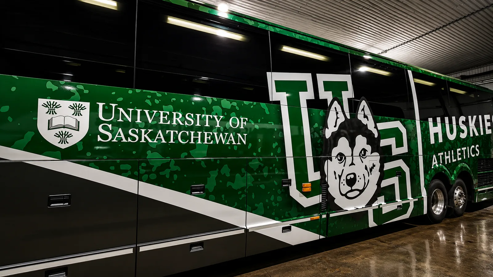 University of Saskatchewan Huskies bus wrap installed by MarkIt Signs Saskatchewan